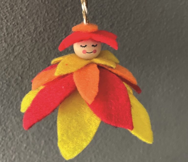 Lustige Blumenkinder für den Frühlingsstrauch